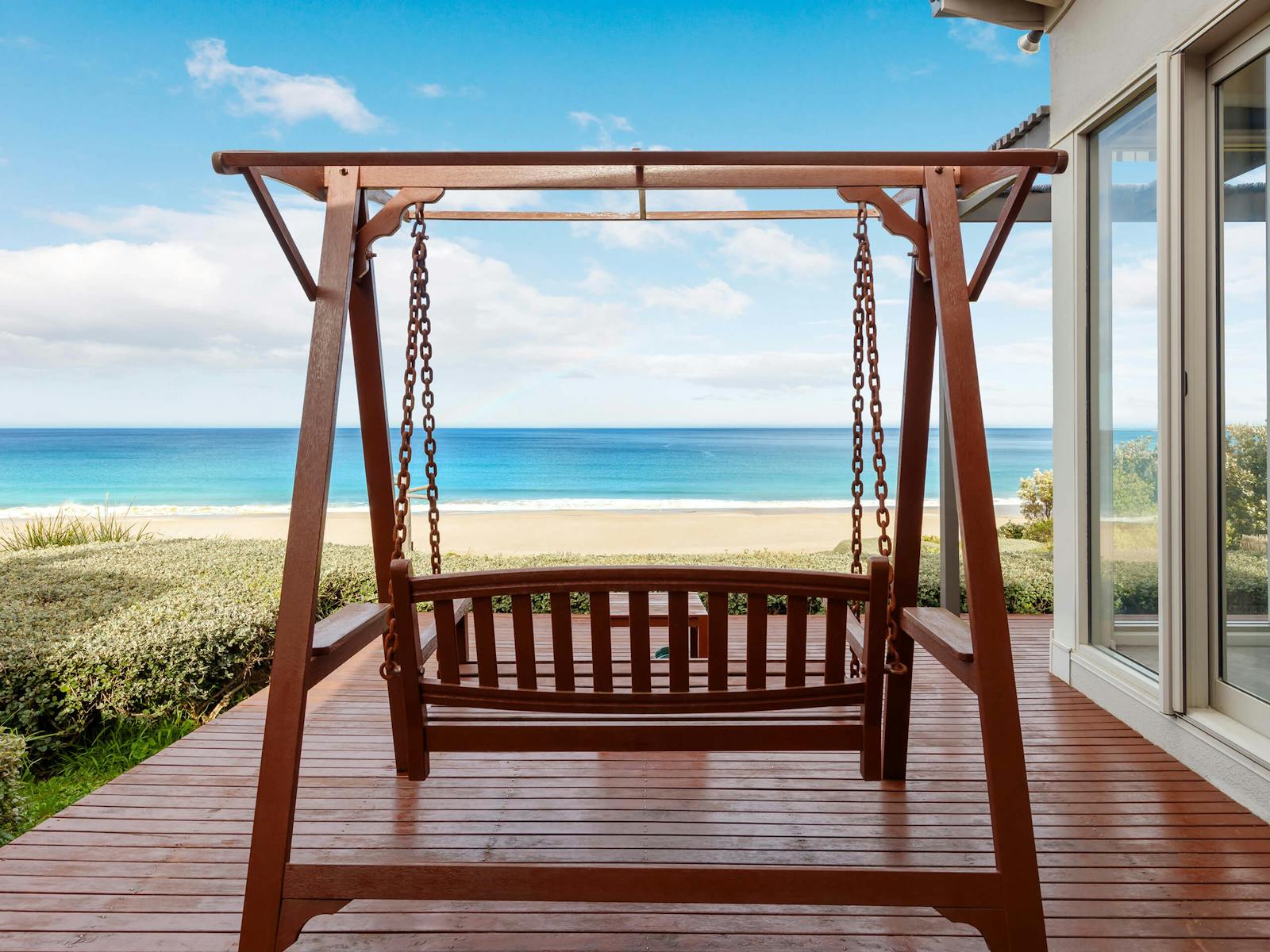 Beachfront Villa swing deck beach views