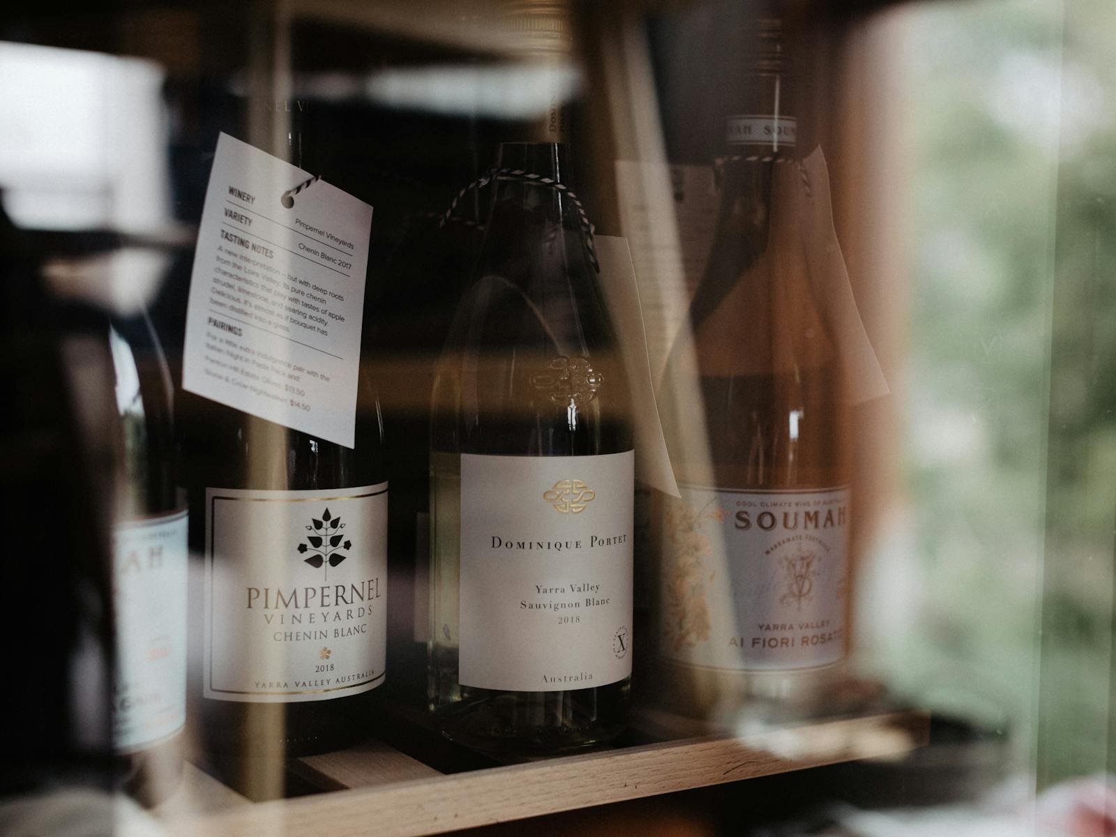 A wine fridge with an assortiment of Yarra Valley wines.