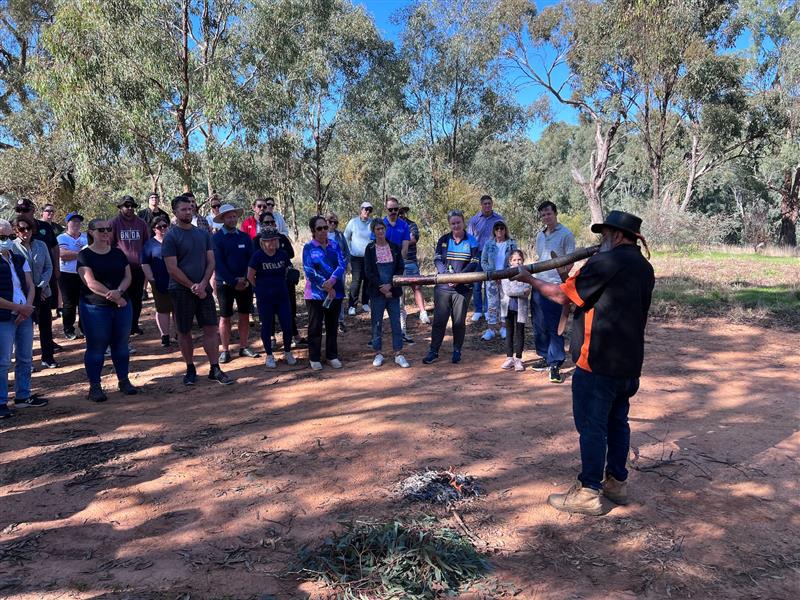 Bangerang elder Uncle Dozer Atkinson leading a cultural walk with a Didgeridoo performance.