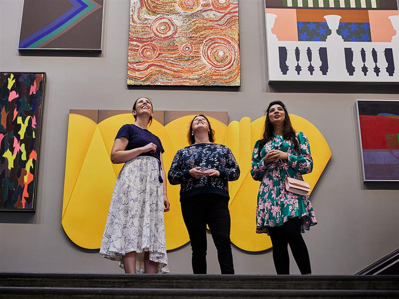 People stand at the top of the stairs of the Art Gallery of Ballarat