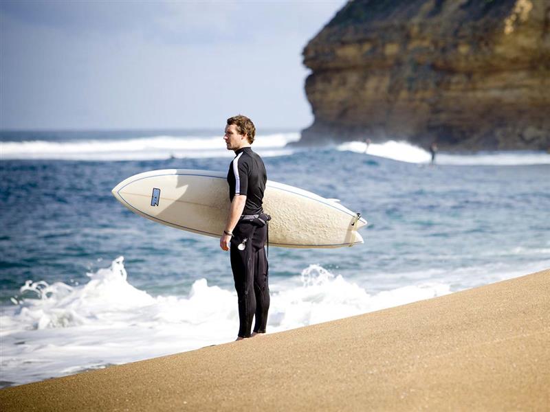 Surfer at Bells Beach, Great Ocean Road, Victoria, Australia